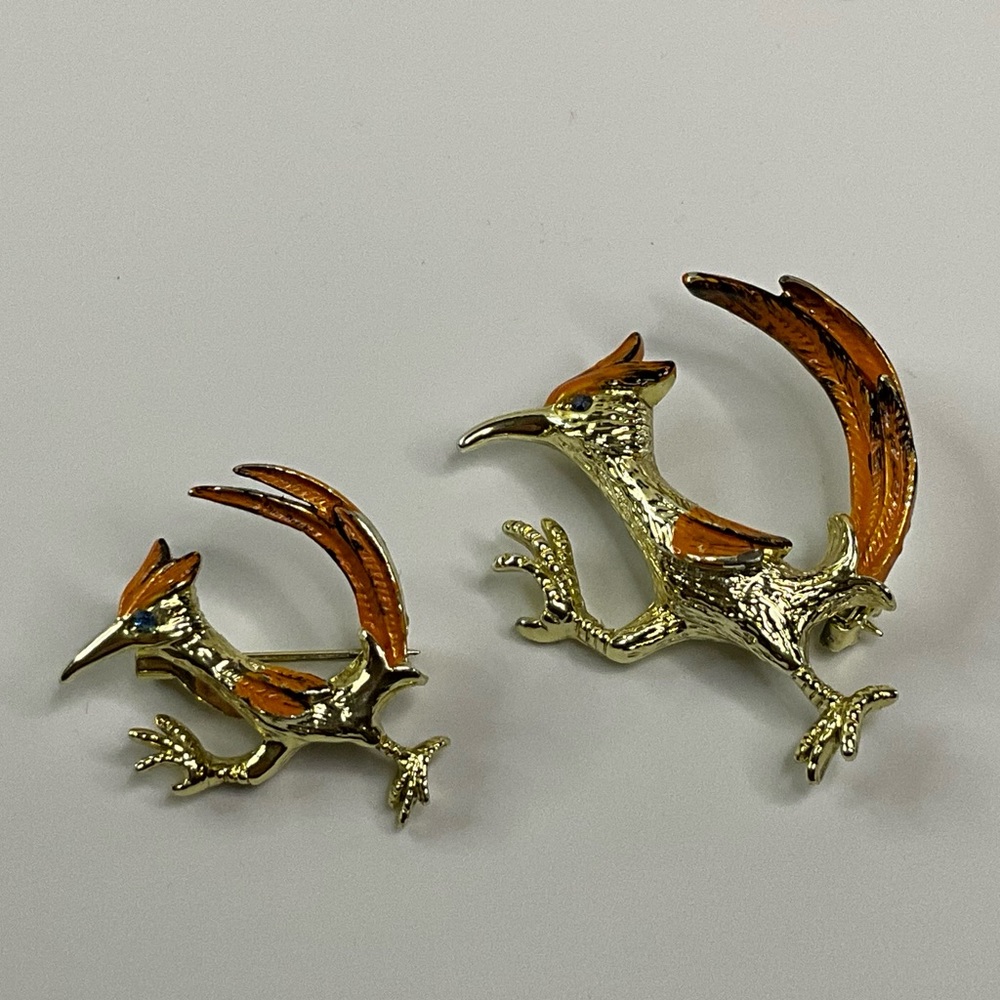 Pair Of Vintage Gold Tone And Orange Road Runner Brooches
